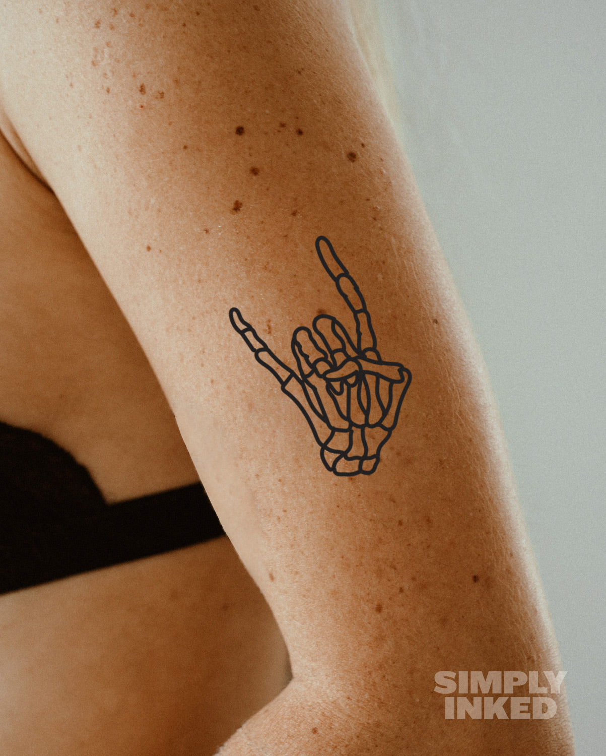 Rock On Skeleton Tattoo
